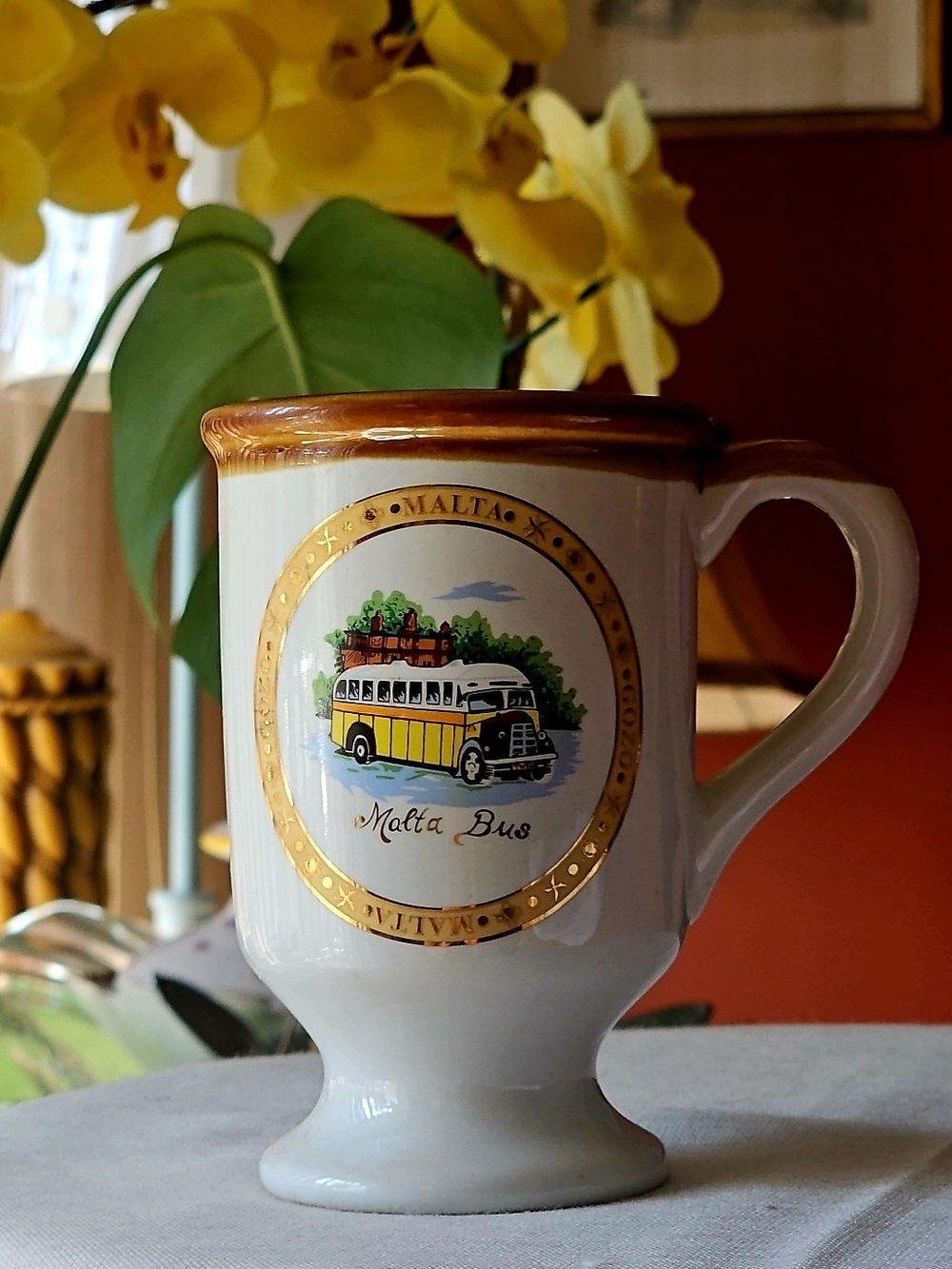 Malta Bus White Brown and Gold Ceramic Pedestal Souvenir Mug